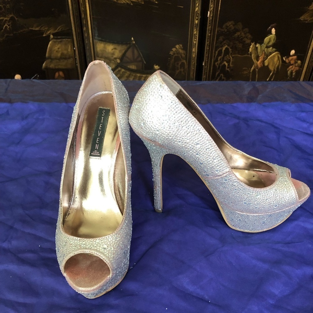 Size 9.5 Steve Madden, rhinestone platform pumps.